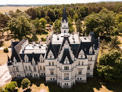 Budmerice Castle from 19th century in nature landscape. Tree in forest park in budmerice, slovakia