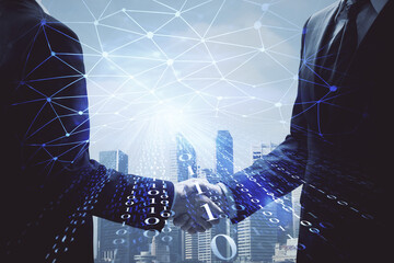 Double exposure of data theme hologram and handshake of two men. Partnership in IT industry concept.