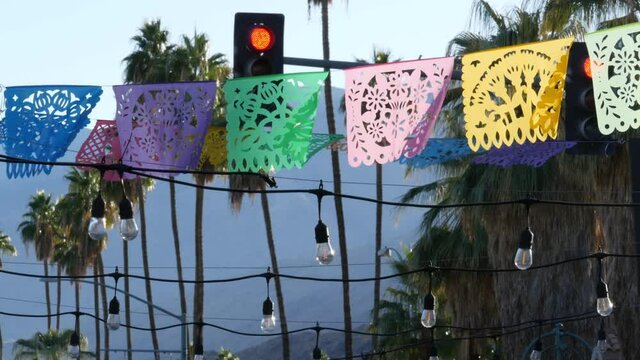Mexican perforated papel picado banner, festival flags, paper tissue garland. Colorful hispanic folk carved street decor for fiesta, holiday or carnival in Latin America, Day of Dead or Dia De Muertos