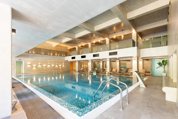 Indoor swimming pool in hotel wellness center