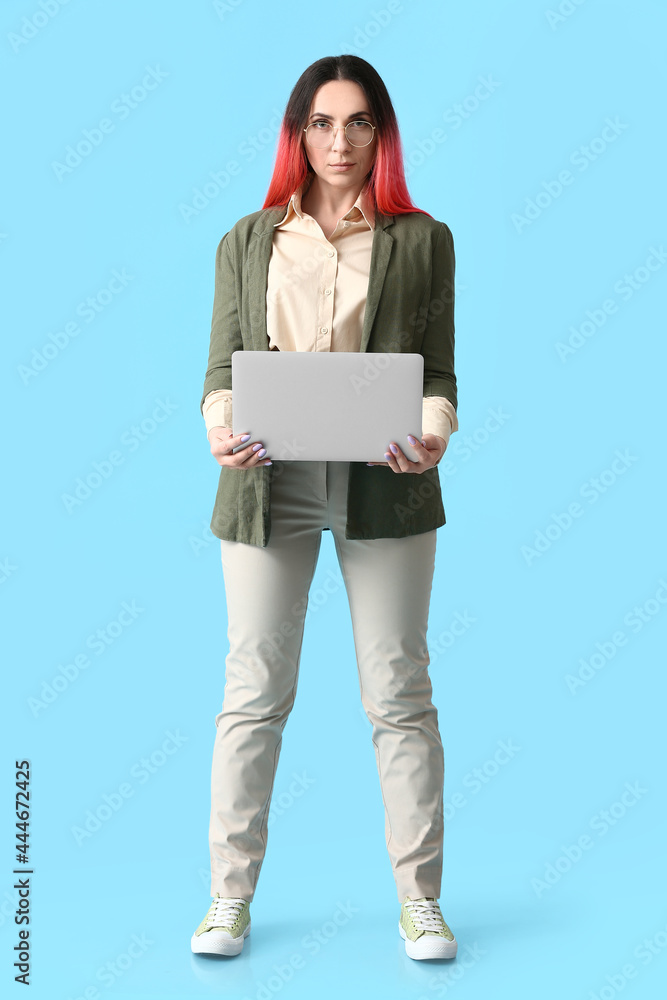 Poster female programmer with laptop on color background