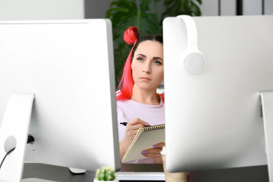 Female programmer working in office