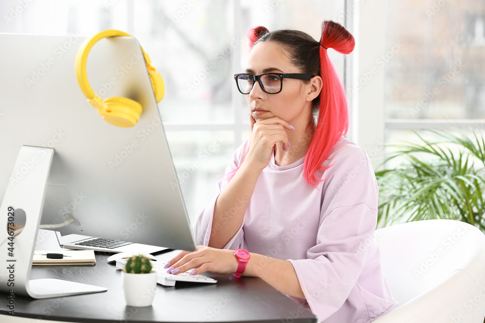 Poster female programmer working with computer in office