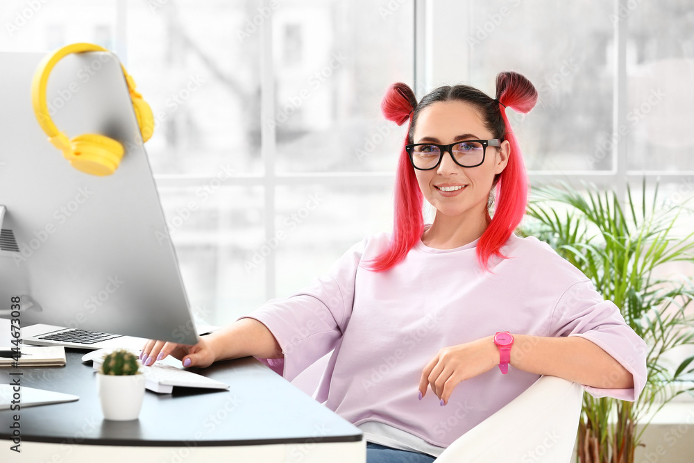 Poster female programmer working with computer in office