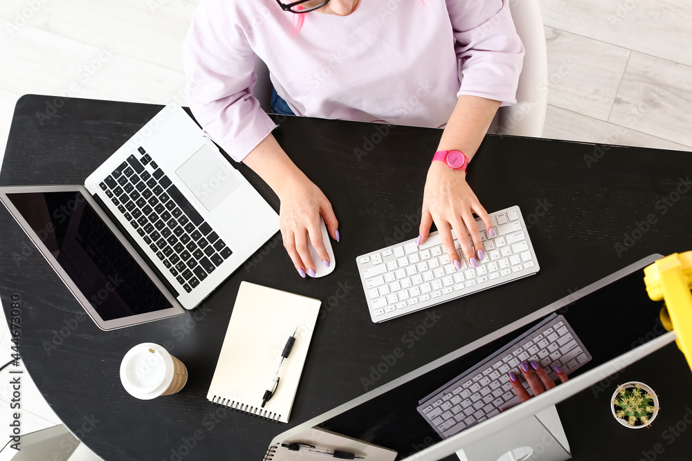 Poster female programmer working with computer in office