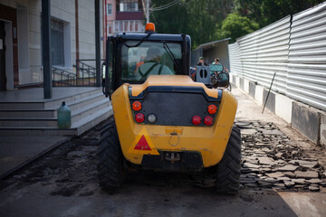 Road repair. Installation of curbs on the highway.