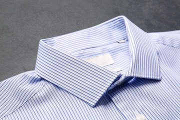 Stylish male shirt on grey background, closeup
