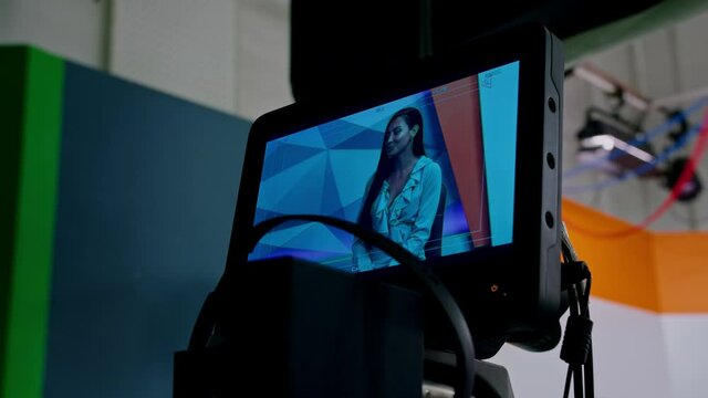 the girl TV presenter is broadcasting live in the studio, communicating with the girl as a guest. prores422