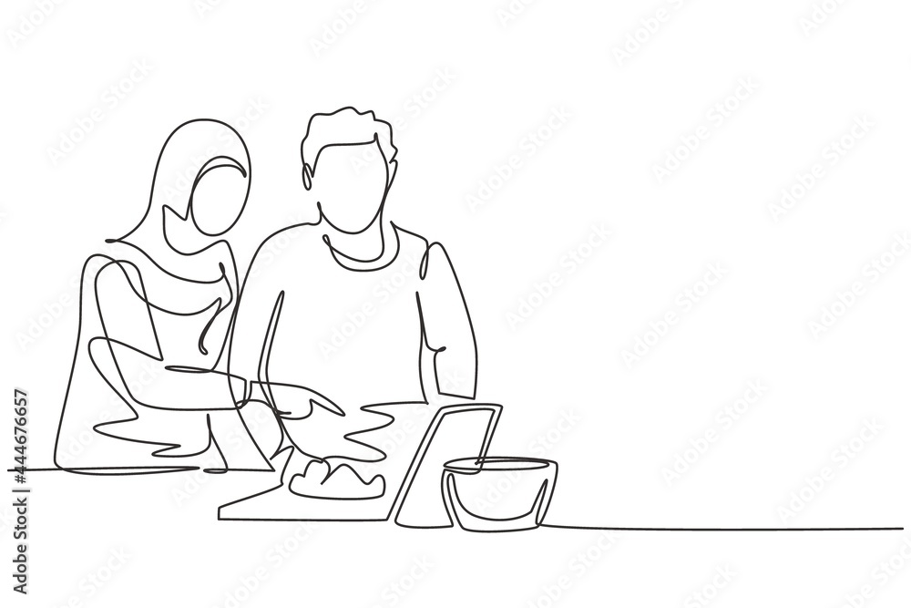 Poster single continuous line drawing romantic arab couple cooking together while watching tutorial from ta
