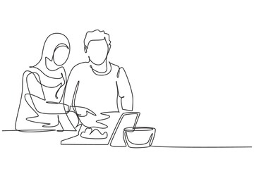 Single continuous line drawing romantic Arab couple cooking together while watching tutorial from tablet. Learn to cook with modern technology. Dynamic one line draw graphic design vector illustration