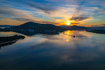 High cloud sunrise winter waterscape