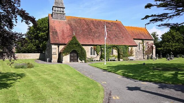 Footage of the entrance to St Peter's Church the Parish Church of Selsey which dates from the 13th century.