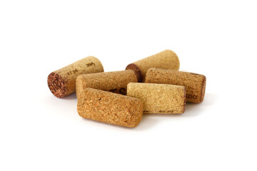 A bunch of corks of wine are gathered.