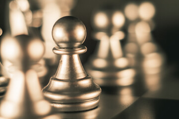 Black pawn on a chessboard