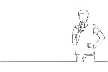 Continuous one line drawing portrait of casual young handsome male drinking orange juice from plastic cup. Make him refreshing in summer season. Single line draw design vector graphic illustration