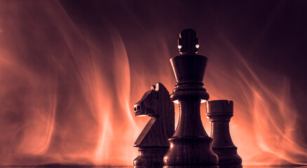 Chess game pieces and smoke
