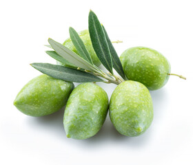 Green natural olives with leaves isolated on a white background.