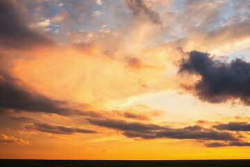 Fototapeta na wymiar Sunset dramatic sky clouds