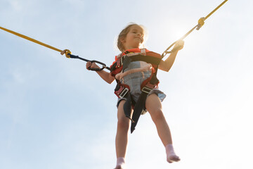 Child jumping child trampoline rubber bands