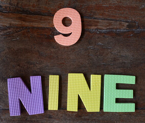 number writes with a puzzle foam mat