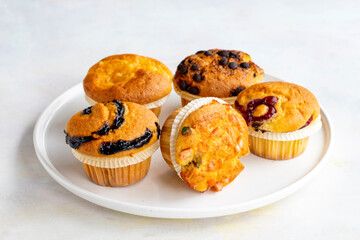 Muffins. Assortment of muffins on a white background.