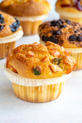 Muffins. Assortment of muffins on a white background.