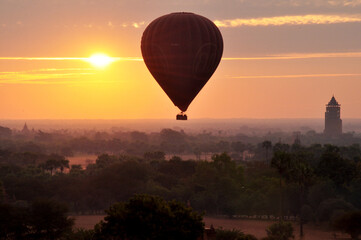 View cityscape of Bagan or Pagan ancient city and landscape UNESCO World Heritage Site and balloon flying bring travelers people looking aerial view on February 2, 2013 in Mandalay, Myanmar or Burma