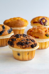 Muffins. Assortment of muffins on a white background.