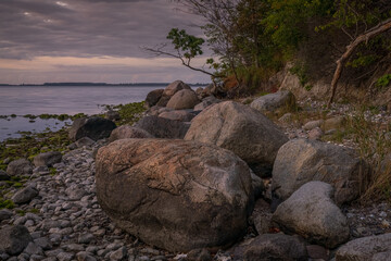 Evening at the Jasmunder Bodden coast on the pebble beach near Lietzow, Mecklenburg-Western Pomerania, Germany