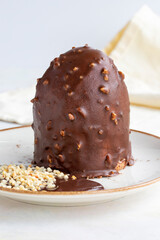 Chocolate and pistachio cake on a white background