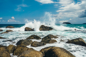Powerful Waves on a rocky beach sunny weather. Summer vacation and nature travel adventure concept.. Summer composition.