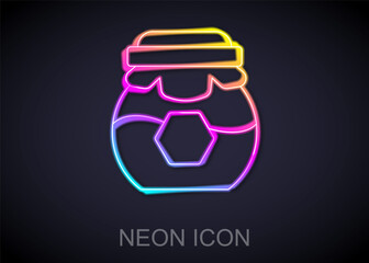 Glowing neon line Jar of honey icon isolated on black background. Food bank. Sweet natural food symbol. Vector