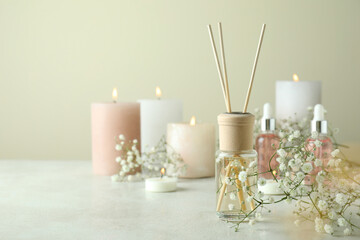 Aromatic concept with diffuser on white textured table