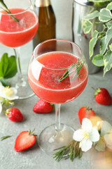 Concept of delicious drink with Rossini cocktail on gray textured table