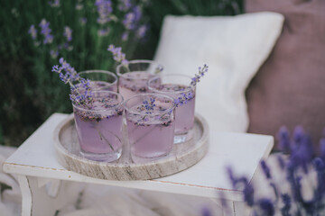 Picnic with fresh homemade lemonade in a lavender field.