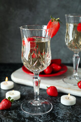 Concept of delicious drink with Rossini cocktail on black smoke table