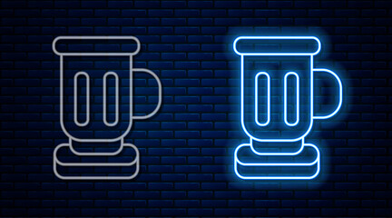 Glowing neon line Medieval goblet icon isolated on brick wall background. Vector