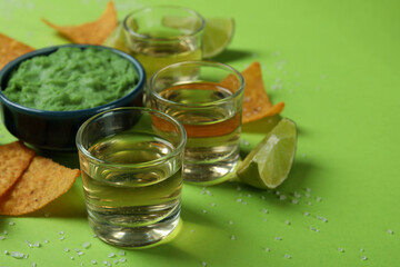 Party concept with tequila, guacamole and chips