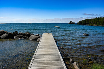 Obraz premium jetty with bathing ladder in lake Vattern Sweden
