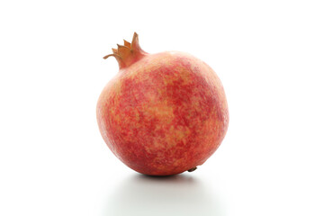 Ripe fresh pomegranate isolated on white background