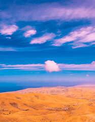 Volcanic desert and blue sky view. Canary islands. Fuerteventura. Stylish nature visual spirits wallpaper. Travel concept