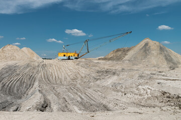 Walking excavator in the titanium ore quarry.