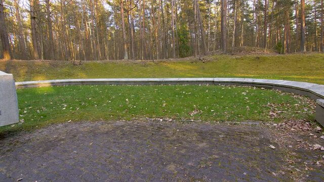 Footage of Paneriai Memorial Park (Paneriu memorialas). Mass killing pit and a commemoration stone. Lithuania