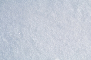 Winter snow. Snow texture Top view of the snow. Texture for design. Snowy white texture. Snowflakes.