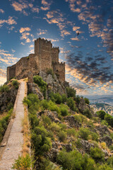 Fototapeta na wymiar Medieval Castle With A Dramatic Sky, Located In Alburquerque, Extremadura, Spain