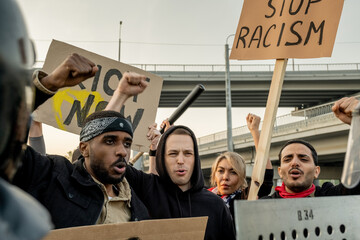Activists giving speech against racism at square