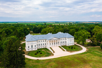 Fototapeta na wymiar Aerial view about Festetics Castle in Deg which is the only classicist castle in Fejer County. The castle is surrounded by the largest English park in Hungary.