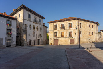 Fototapeta na wymiar Santa Ana square in the old town of the beautiful village of Llanes in north of Spain at sunrise.