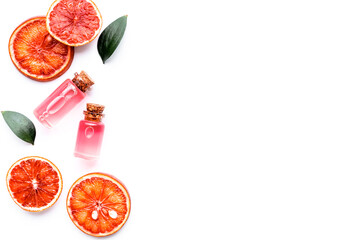 Flat lay of citrus cosmetic with essential oil vitamin c