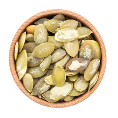 Full bowl of pumpkin seeds isolated on white background. File contains clipping path.